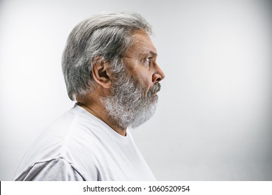 Wow. Attractive Male Half-length Front Portrait On White Studio Backgroud. Senior Emotional Surprised Bearded Man With Open Mouth. Human Emotions, Facial Expression Concept. Profile