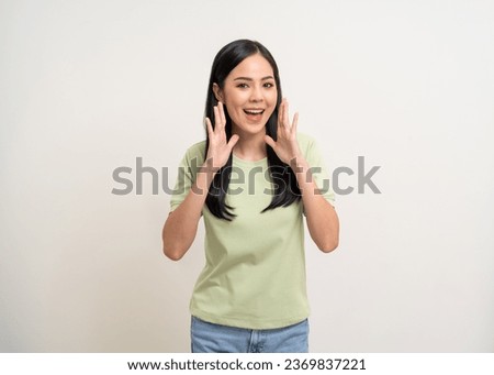 Wow Happy beautiful young asian woman excited pretty girl shout out loud wow with hands on mouth announcement standing pose looking camera on isolated white background.