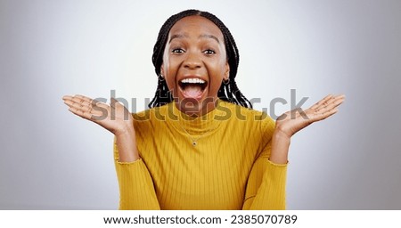 Wow, portrait and excited black woman in studio happy with competition news, prize or bonus on grey background. Surprise, omg or face of happy female winner with mind blown emoji or lotto results