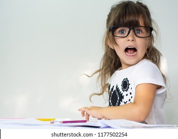 Wow! Shocked Child Learning In Classroom Or Elementary School. Preschool Kids.