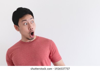 Wow And Shocked Face Of Funny Asian Man Isolated On White Background.