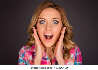 Wow! Shocked Woman With Open Mouth Touching Her Face