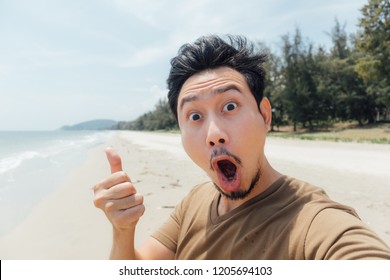 Wow And Surprised Face Of Asian Man Selfie Himself On The Beach Of Thailand.