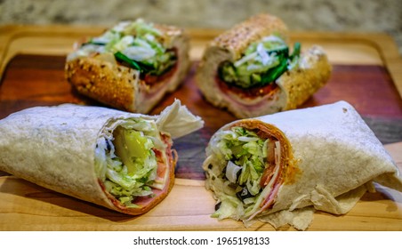 Wrap and Sub Sandwiches on Cutting Board