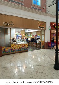 The Wrapit Shawarma Restaurant At Villaggio Shopping Mall  The Language Is In Arabic And English.  - Doha Qatar - Sep 2022