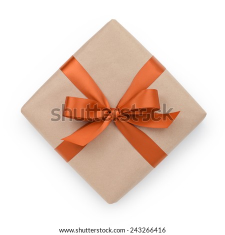 wrapped brown present box with orange ribbon bow, isolated on white