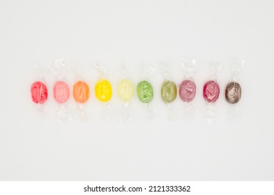 Wrapped Colorful Candies Transparent Cellophane Isolated On White Background