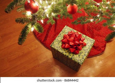 Wrapped Present Under A Christmas Tree