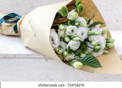 Wrapped White Eustoma Flowers Bouquet 