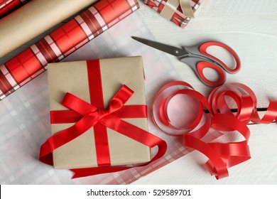 Wrapping Paper With Gifts On The Table. New Year Concept.
