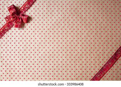 Wrapping Paper With Hearts , Ribbon And Bows