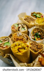 Wraps In A Box With Sweet Potato Fried. Shoot From The Top. 