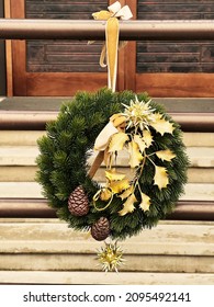 Wreath decoration at door for Christmas holiday. High quality photo