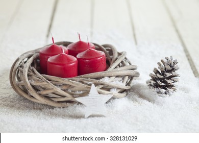 Wreath, red candles, wooden star, fir cone, copy space