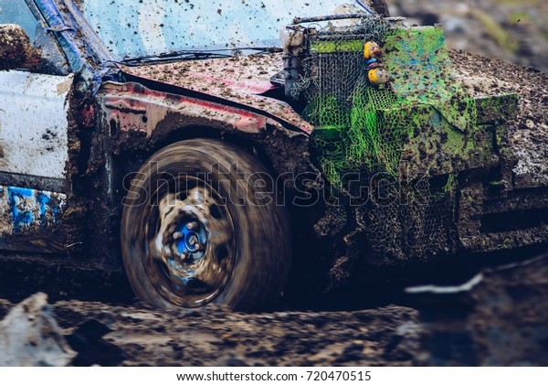 Wreck car dirt race on muddy
track