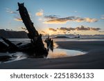 Wreck of the Helvetia, shipwreck on Rhossili beach at sunset, no people. Gower Peninsula, South Wales, the United Kingdom, UK GB.