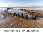 The wreck of the Norwegian ship SS Nornen which ran aground on the beach at Berrow near Burnham-on-Sea, UK in 1897 due to gale force winds.