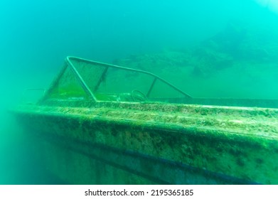 Wreck of recreational speed boat scuttled in a quarry as a scuba diving site - Shutterstock ID 2195365185
