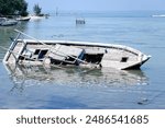 Wreck of sinking traditional wooden boat in Pari Island, Jakarta