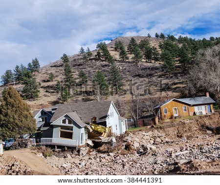 Wreckage, collapsed, flattened wooden houses caused from a tornado damage in the Northern of Colorado State, USA.