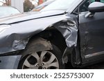 wrecked car close-up, severely damaged car after car accident, Huge dent in car body, safety first, reckless driving, insurance claim, repair costs