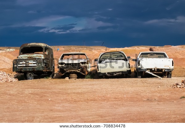 Wrecked\
cars in the desert, Coober Pedy, South\
Australia