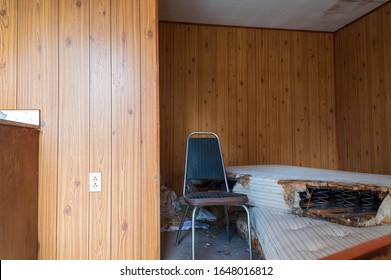 Wrecked Mattresses In An Abandoned Motel Room