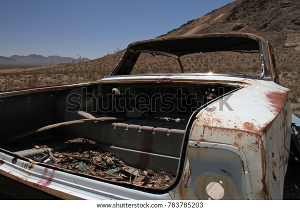 Wrecked and\
rusty car in the desert of Death\
Valley