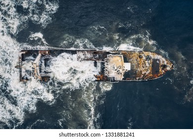 Wrecked Ship In The Stormy Sea Aerial Drone Top-bottom View