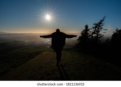 The Wreckin sunset with a model posing over the landscape