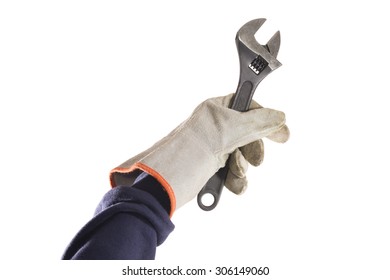 Wrench being handled with a grey leather glove isolated over white background