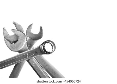 Wrenches of various sizes on white background