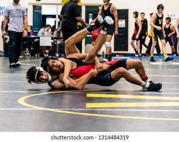 Wrestler From Buena High School Attempting Gain Control On Rio Mesa Athlete During Tournament At Ventura High School In California USA On February 2, 2019.