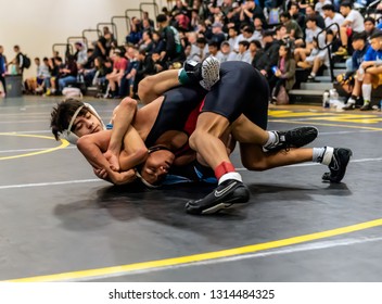 Wrestler From Buena High School Attempting A Tilt On Rio Mesa Athlete During Tournament At Ventura High School In California USA On February 2, 2019.