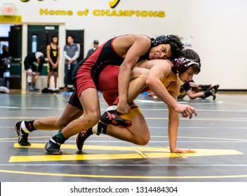 Wrestler From Oxanrd High School Attempting An Escape On Rio Mesa Athlete During Tournament At Ventura High School In California USA On February 2, 2019.