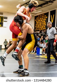 Wrestler From Ventura High School Attempting A Single Leg Takedown On Oxnard Athlete During Tournament At Ventura High School In California USA On February 2, 2019.