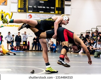 Wrestler From Ventura High School Driving Rio Mesa Athlete Off His Feet During Tournament At Ventura High School In California USA On February 2, 2019.