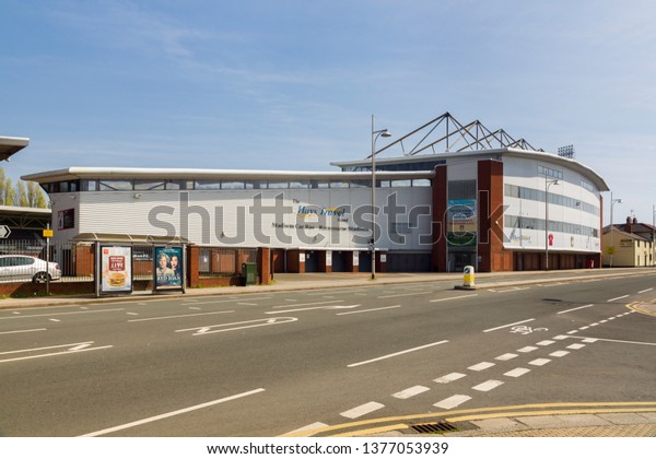 Wrexham, UK - April 20 2019:\
Wrexham football stadium known as the Racecourse Ground established\
in 1864 it is the largest football ground in North\
Wales