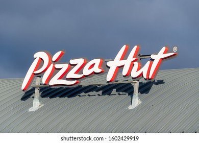 WREXHAM, UNITED KINGDOM - DECEMBER 25th, 2019: Pizza Hut Resturant Store Sign