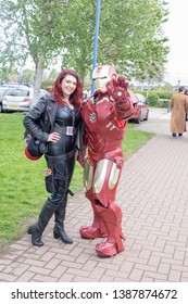 Wrexham, Wales - April 28th, 2019: Wales Comic Con - Cosplayers Dressed As Black Widow And Iron Man