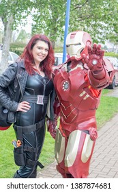 Wrexham, Wales - April 28th, 2019: Wales Comic Con - Cosplayers Dressed As Black Widow And Iron Man