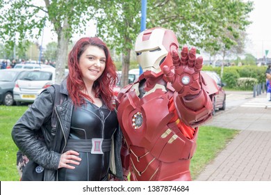 Wrexham, Wales - April 28th, 2019: Wales Comic Con - Cosplayers Dressed As Black Widow And Iron Man