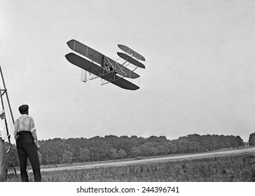 Wright's airplane in Army trial flights at Fort Meyer Virginia in July 1909. In 1908 the Wright Brothers contracted with the Army to develop an a two-seater paid 25 000 600 000 is 2010 equivalent.