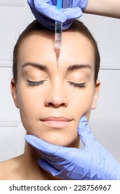 Wrinkle Reduction, The Lion's Wrinkle Injection Botox.Portrait Of A White Woman During Surgery Filling Facial Wrinkles 