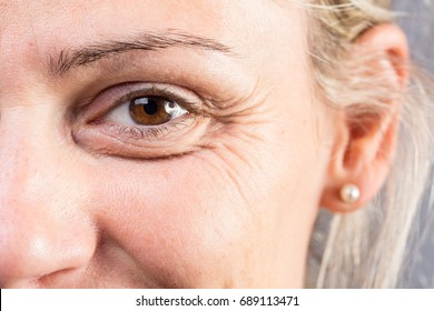 Wrinkled eye of beautiful lady - Shutterstock ID 689113471