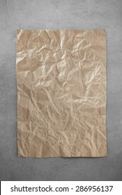 wrinkled paper at metal