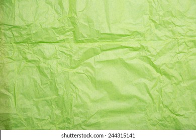 Wrinkled paper texture, green wrapping paper 