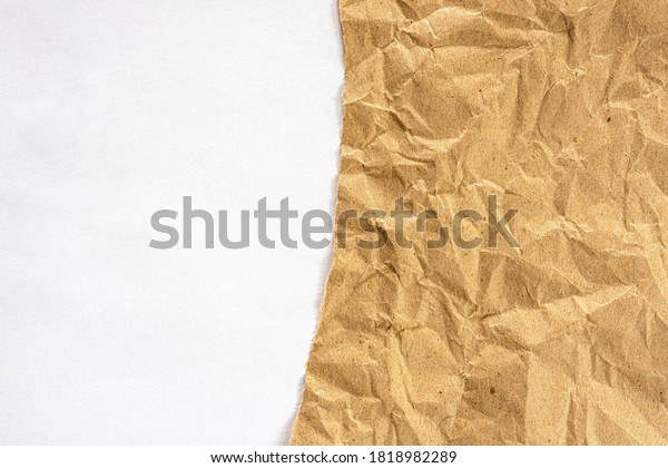 Wrinkled torn kraft paper on pure\
white paper. It could be used for background and\
texture.