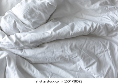 Wrinkled White Blanket As A Background.