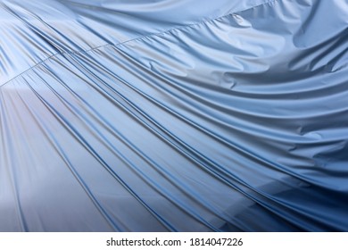 The Wrinkles Of The Old Car Tarp